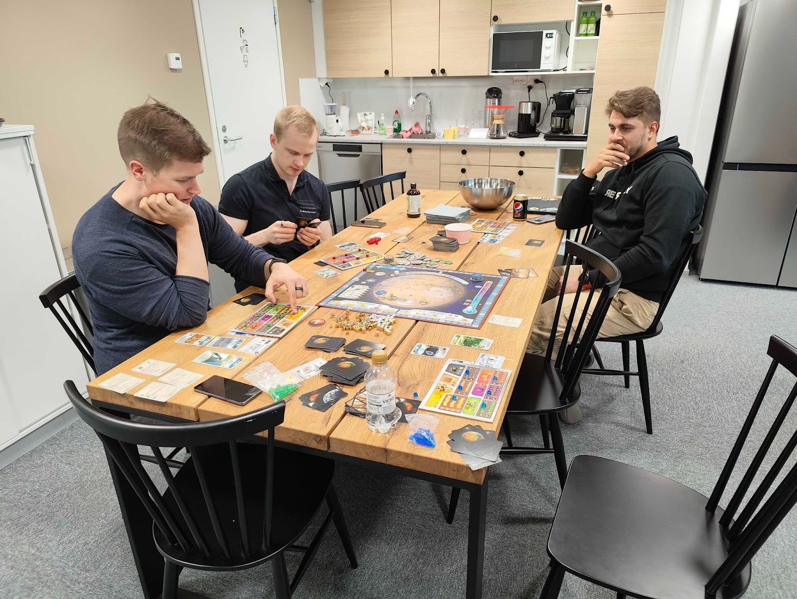 Regular board game nights at the Tampere office have always been a great success. Here we are playing Terraforming Mars.