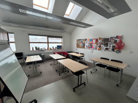 Youth room example set up, with desks and white board