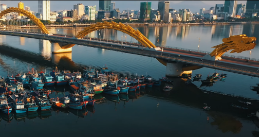 yellow bridge with city view