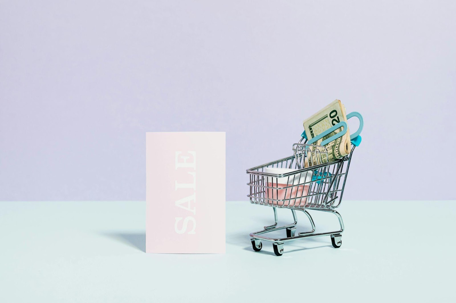 shopping cart and a "sale" sign