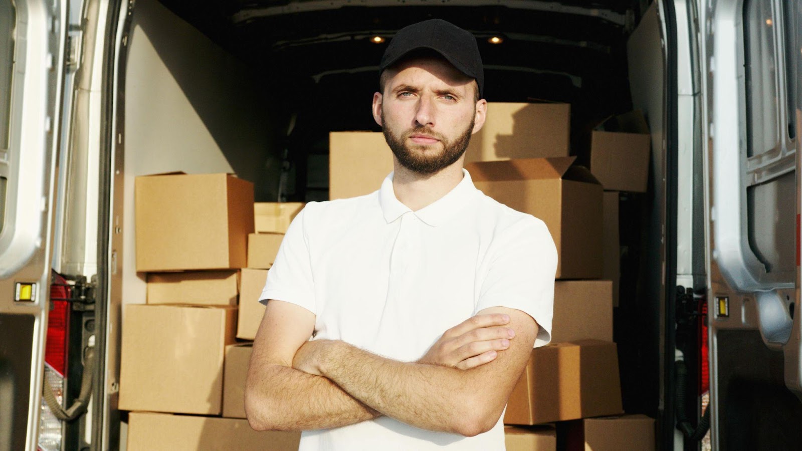 https://www.pexels.com/photo/man-in-white-polo-shirt-standing-5025633/