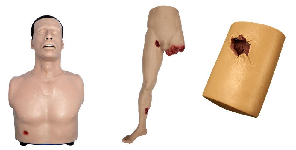 A group of mannequins with a broken leg

Description automatically generated